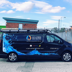 a black work van of JB Plumbing and Heating in Manchester