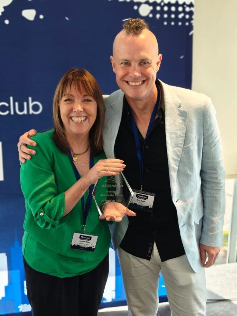 Jeanette and Troy Dean receiving an Agency Mavericks award