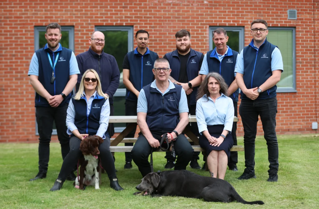 amita team and two dogs